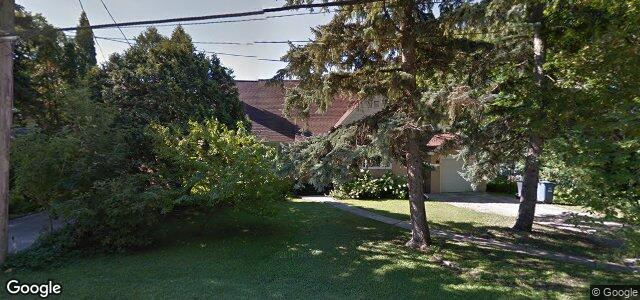 Larawan ng 50 Deer Lodge Place sa Winnipeg, Manitoba